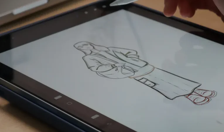 Hand using a stylus to sketch on a digital tablet, illustrating the Krea AI real-time image generation review