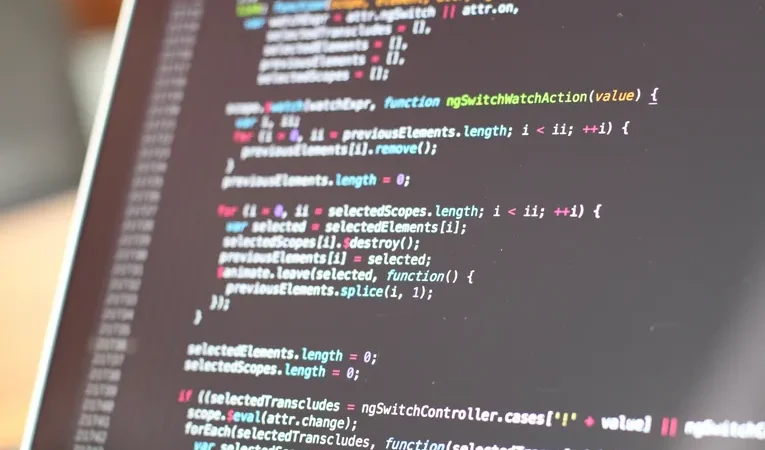 Dark terminal screen displaying code, illustrating the Warp AI terminal review