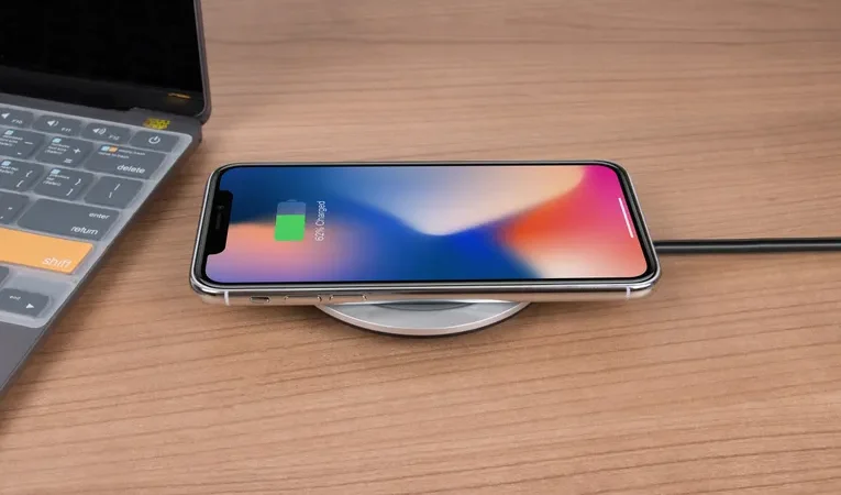 Smartphone charging close-up, illustrating public USB charging port safety and juice jacking risks